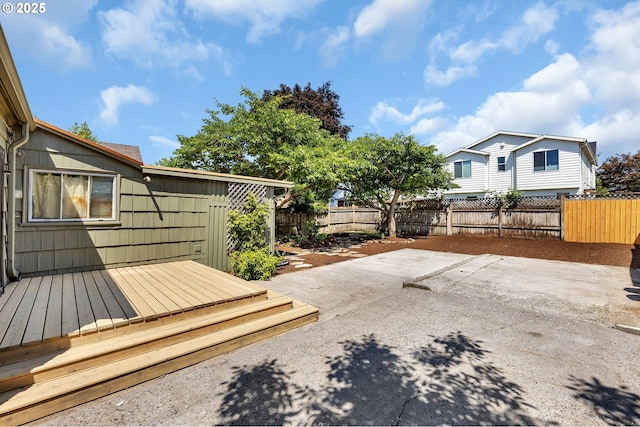 6206 N Denver Ave, Portland, OR 97217 - fenced backyard featuring a deck and a patio