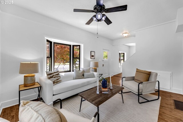 6206 N Denver Ave, Portland, OR 97217 - living room with ceiling fan, wood finished floors, and baseboards
