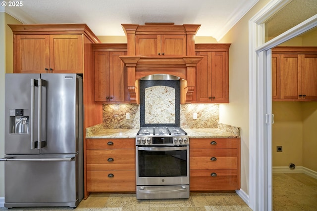 kitchen featuring tasteful backsplash, ornamental molding, stainless steel appliances, and light stone countertops