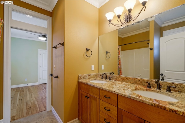 bathroom with wood-type flooring, ornamental molding, vanity, a notable chandelier, and a shower with curtain