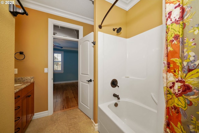 bathroom with vanity, shower / bath combo, tile patterned floors, and crown molding