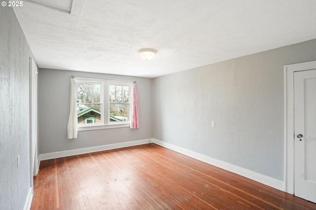 1825 NE 4th St, Salem, OR 97301 - unfurnished room featuring hardwood / wood-style flooring and baseboards