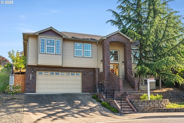 1748 Hardin Ave NW, Salem, OR 97304 - view of front of home featuring brick siding, concrete driveway, and a garage