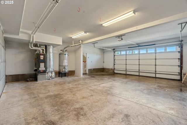1748 Hardin Ave NW, Salem, OR 97304 - garage with strapped water heater, heating unit, and a garage door opener