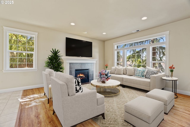 1748 Hardin Ave NW, Salem, OR 97304 - living area with healthy amount of natural light, a fireplace, baseboards, recessed lighting, and wood finished floors