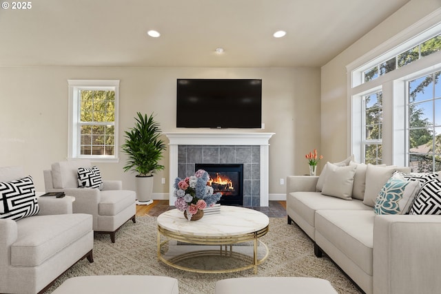 1748 Hardin Ave NW, Salem, OR 97304 - living area featuring recessed lighting, a fireplace, wood finished floors, and baseboards