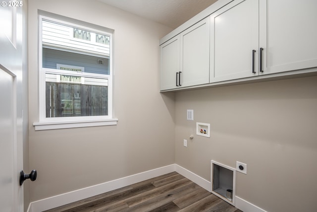 24934 Westfield Ave, Veneta, OR 97487 - laundry room featuring hookup for an electric dryer, cabinet space, dark wood-style floors, and washer hookup