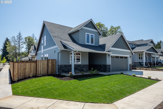 24934 Westfield Ave, Veneta, OR 97487 - craftsman inspired home with concrete driveway, roof with shingles, an attached garage, and stone siding