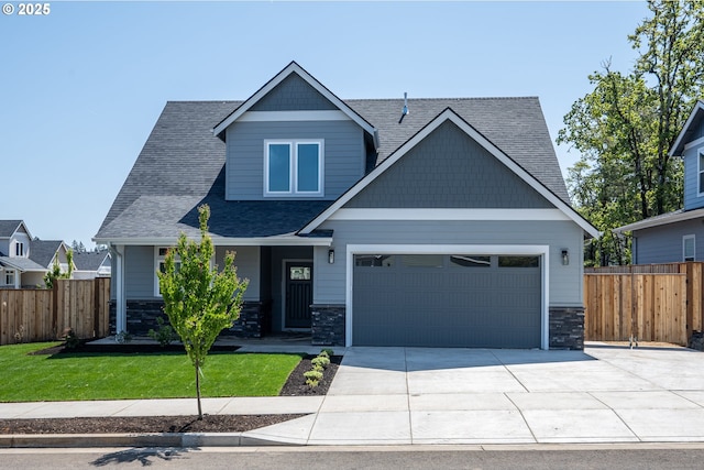 24934 Westfield Ave, Veneta, OR 97487 - craftsman-style home featuring a garage, concrete driveway, roof with shingles, and stone siding