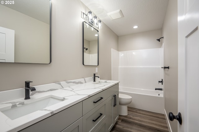 24934 Westfield Ave, Veneta, OR 97487 - full bath featuring wood finished floors, double vanity, shower / washtub combination, and a textured ceiling