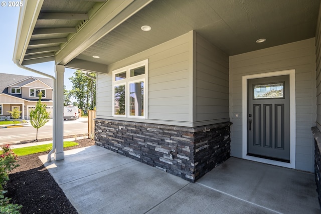 24934 Westfield Ave, Veneta, OR 97487 - view of exterior entry featuring a porch and stone siding