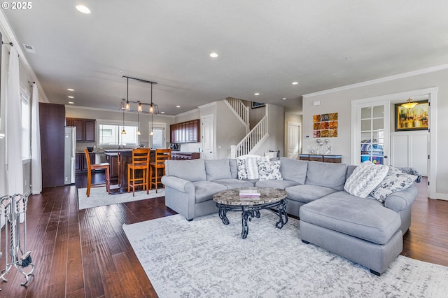 12329 SW Athens Ln, Wilsonville, OR 97070 - living area featuring crown molding, stairway, dark wood-style flooring, and recessed lighting