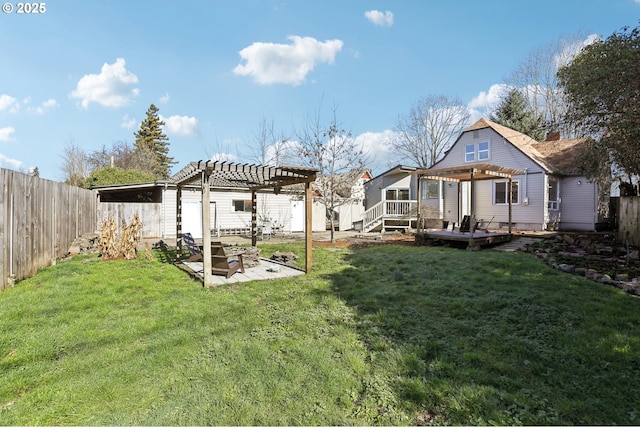 view of yard featuring a patio area, a fenced backyard, and a pergola