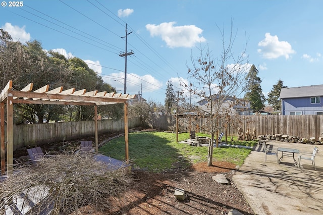 view of yard with a fenced backyard, a patio, and a pergola