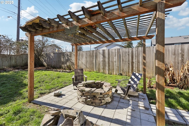 view of patio / terrace with an outdoor fire pit, a pergola, and a fenced backyard