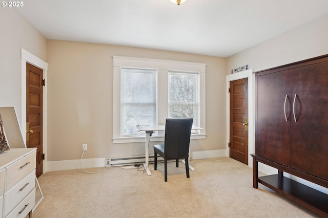 office featuring baseboards, a baseboard radiator, and light carpet