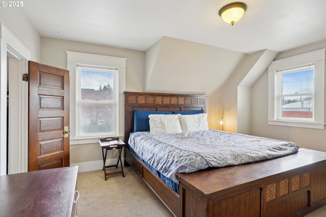 carpeted bedroom with baseboards