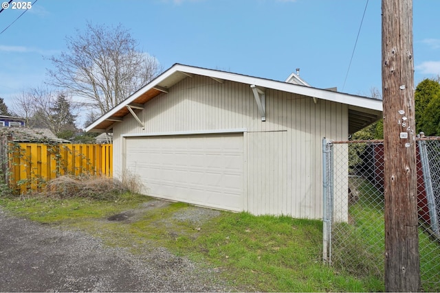 detached garage with fence