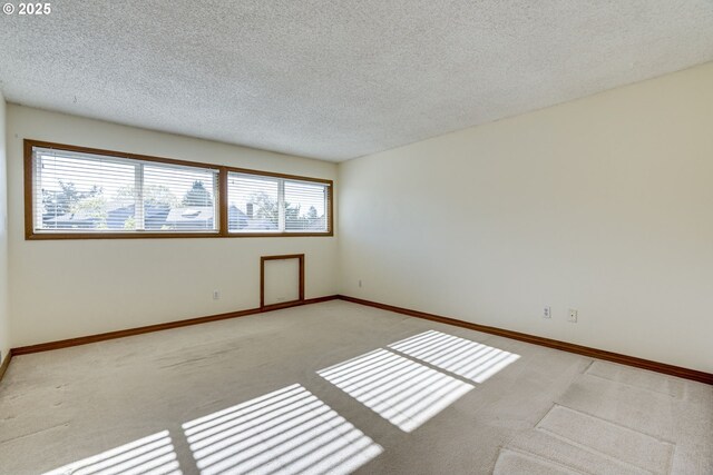 7430 SW Greens View Ct, Wilsonville, OR 97070 - unfurnished bedroom featuring carpet, a closet, a textured ceiling, baseboards, and recessed lighting