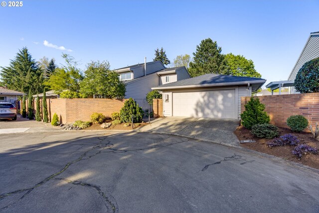 7430 SW Greens View Ct, Wilsonville, OR 97070 - entrance foyer with stairway, light wood-style floors, baseboards, and a textured ceiling