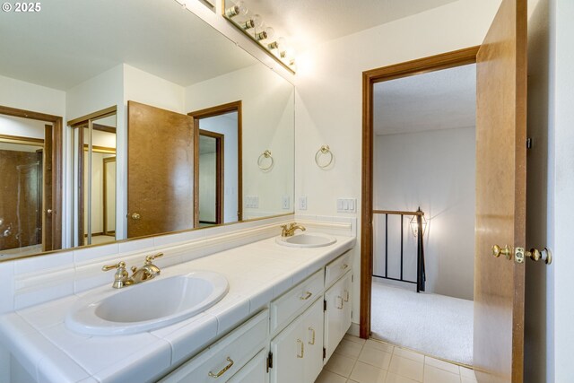 7430 SW Greens View Ct, Wilsonville, OR 97070 - bathroom featuring tile patterned floors, double vanity, a walk in shower, and toilet