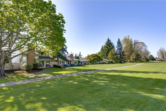 7430 SW Greens View Ct, Wilsonville, OR 97070 - view of community with a residential view and a yard
