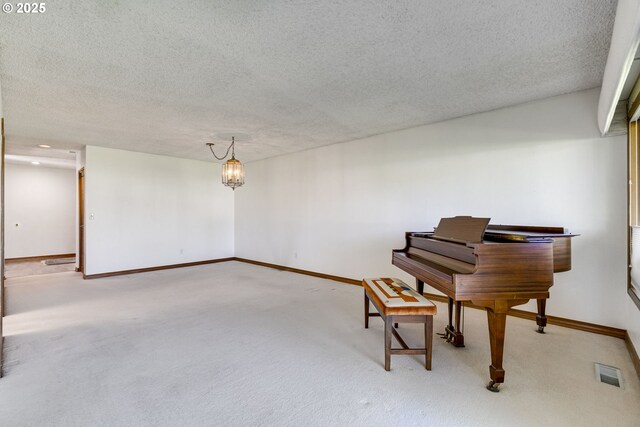 7430 SW Greens View Ct, Wilsonville, OR 97070 - living area featuring a textured ceiling, carpet flooring, a chandelier, baseboards, and a fireplace