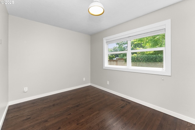 14255 NE Brazee St, Portland, OR 97230 - empty room featuring dark wood-style flooring