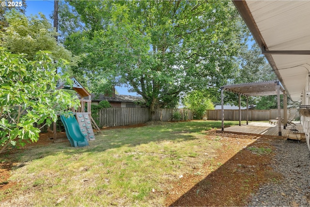 14255 NE Brazee St, Portland, OR 97230 - fenced backyard featuring a playground and a deck