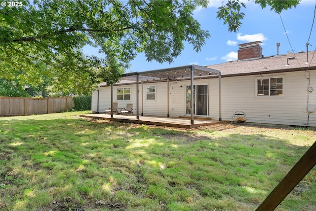 14255 NE Brazee St, Portland, OR 97230 - rear view of house with a fenced backyard, a deck, a pergola, and a chimney