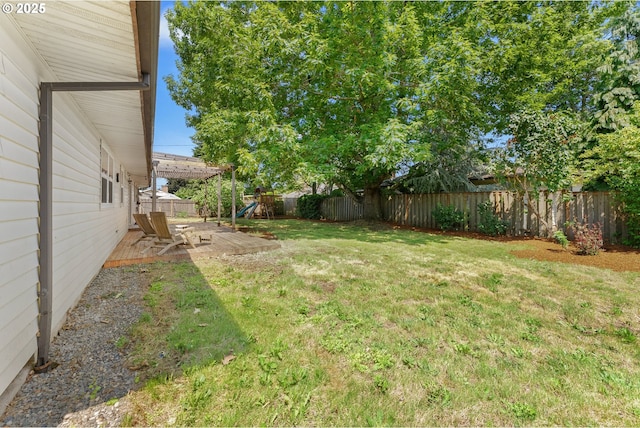 14255 NE Brazee St, Portland, OR 97230 - fenced backyard with a playground and a patio area