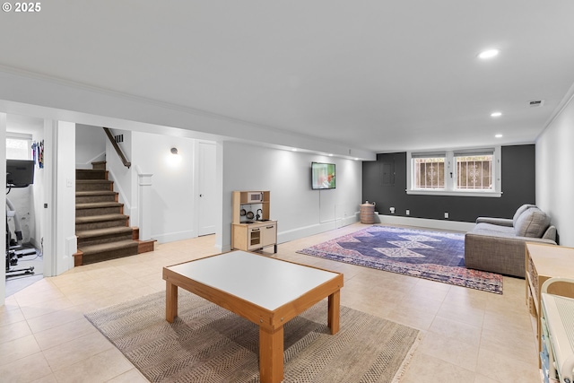 living room with stairs, ornamental molding, light tile patterned flooring, visible vents, and recessed lighting