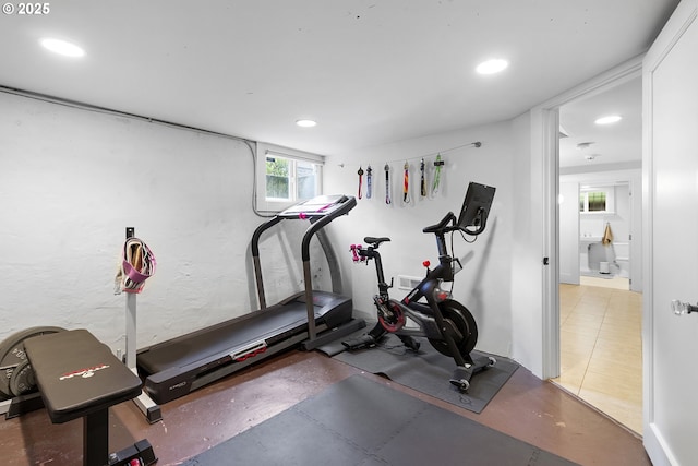 exercise room with recessed lighting