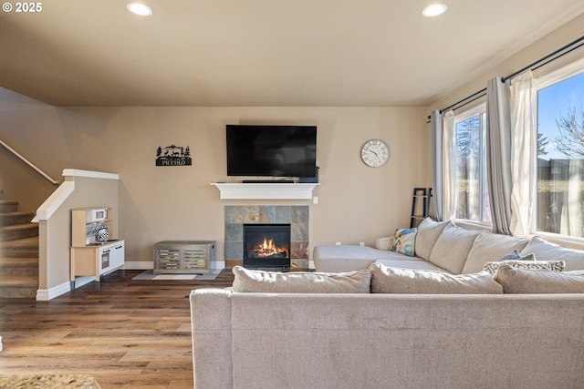 dining room with visible vents, a textured ceiling, baseboards, and wood finished floors