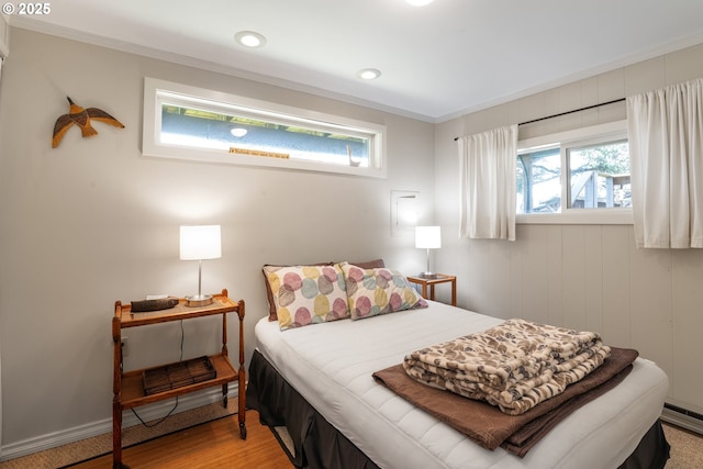 5870 Floyd Ave, Cloverdale, OR 97112 - bedroom featuring ornamental molding, light wood-style flooring, and recessed lighting