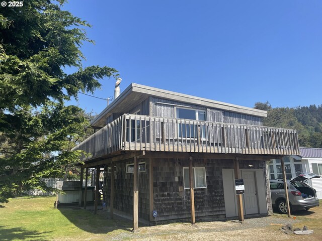 5870 Floyd Ave, Cloverdale, OR 97112 - back of property with a yard and a deck