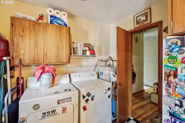 1304 NE 79th Ave, Portland, OR 97213 - washroom with cabinet space, washing machine and dryer, water heater, and wood finished floors