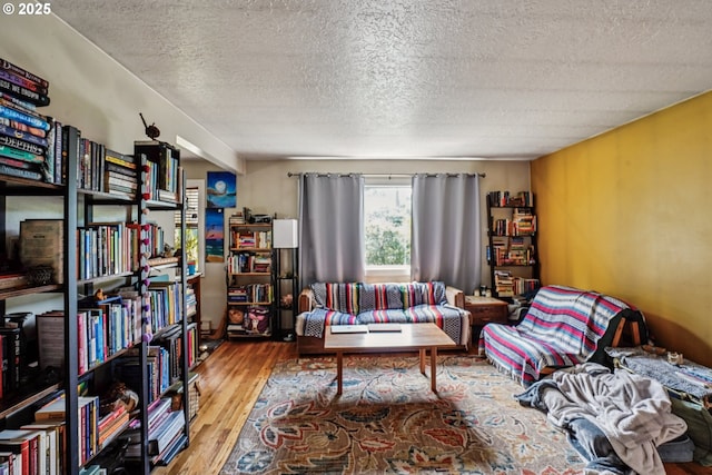 1304 NE 79th Ave, Portland, OR 97213 - living room featuring wood finished floors and a textured ceiling