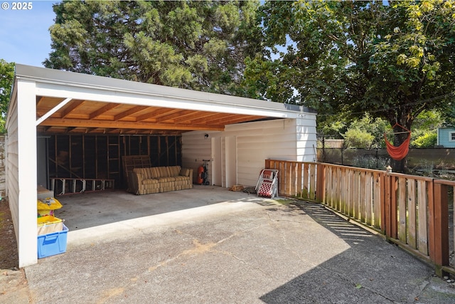 1304 NE 79th Ave, Portland, OR 97213 - view of parking / parking lot with a carport, driveway, and an exterior structure