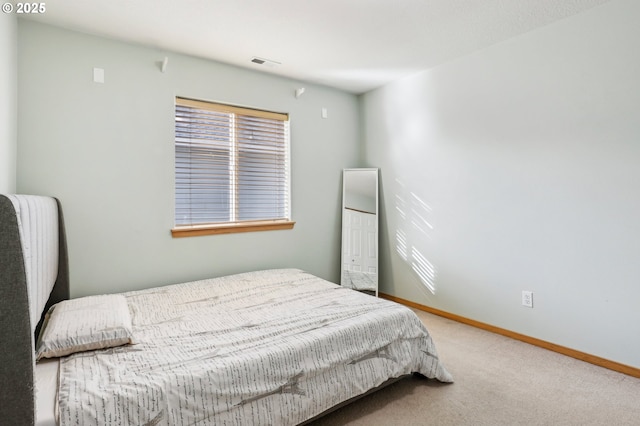 bedroom featuring carpet