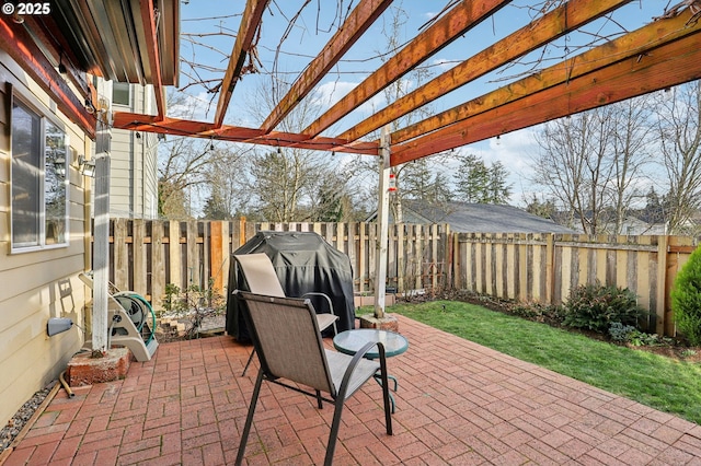 view of patio / terrace featuring grilling area and a pergola