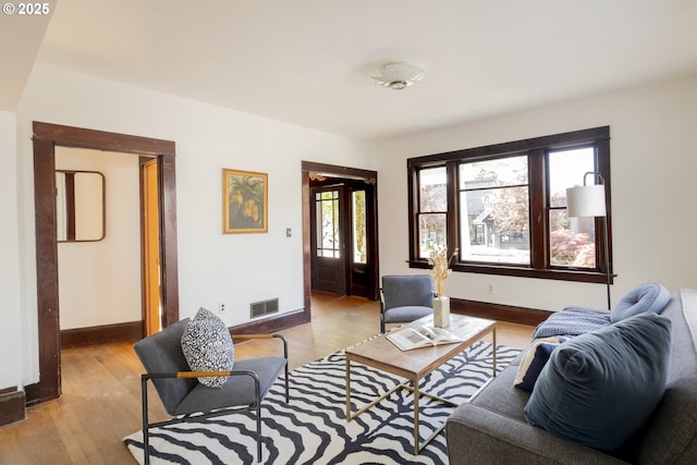 1818 N Killingsworth St, Portland, OR 97217 - living area with light wood finished floors and baseboards