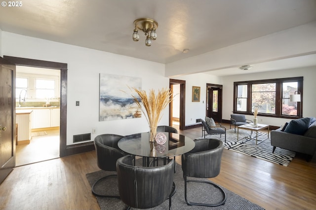 1818 N Killingsworth St, Portland, OR 97217 - living area featuring wood finished floors and baseboards