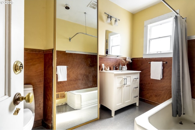 1818 N Killingsworth St, Portland, OR 97217 - bathroom with a bath, toilet, vanity, a wainscoted wall, and a shower with curtain