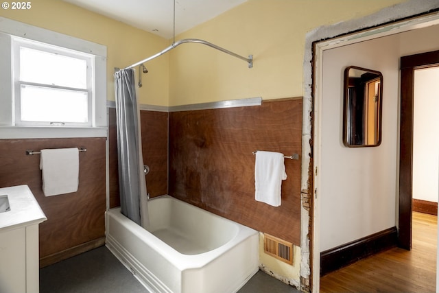 1818 N Killingsworth St, Portland, OR 97217 - bathroom with shower / bath combo with shower curtain, vanity, and wood finished floors