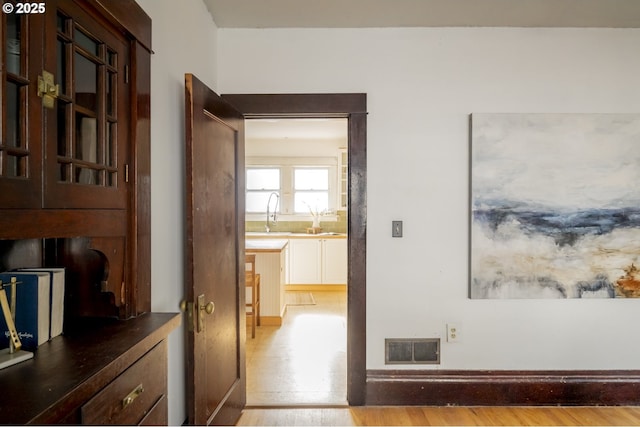 1818 N Killingsworth St, Portland, OR 97217 - hallway featuring wood finished floors