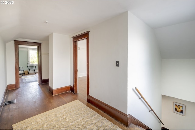 1818 N Killingsworth St, Portland, OR 97217 - hallway featuring an upstairs landing, lofted ceiling, wood finished floors, and baseboards