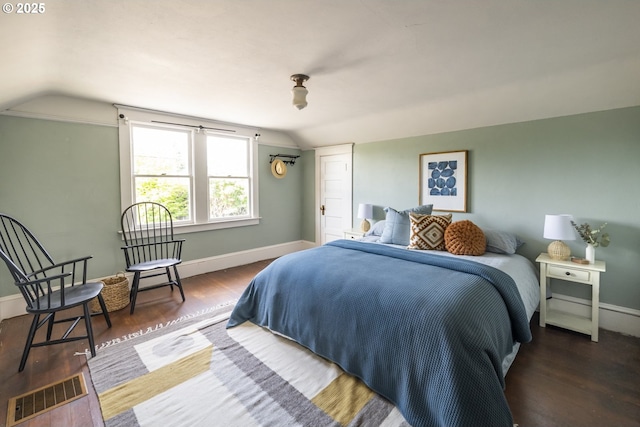 1818 N Killingsworth St, Portland, OR 97217 - bedroom with vaulted ceiling, wood finished floors, and baseboards
