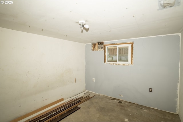 1818 N Killingsworth St, Portland, OR 97217 - empty room featuring concrete flooring