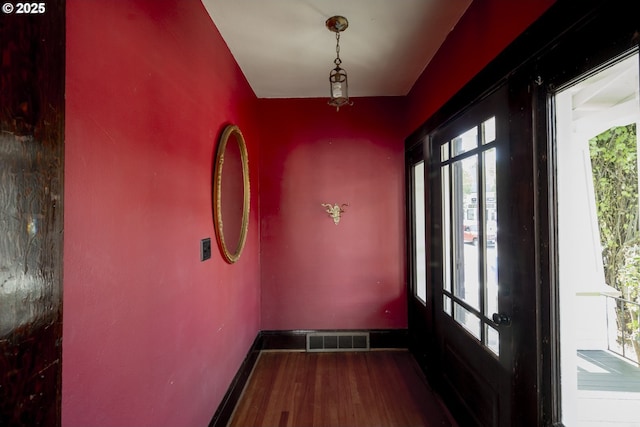 1818 N Killingsworth St, Portland, OR 97217 - unfurnished room featuring wood finished floors and baseboards